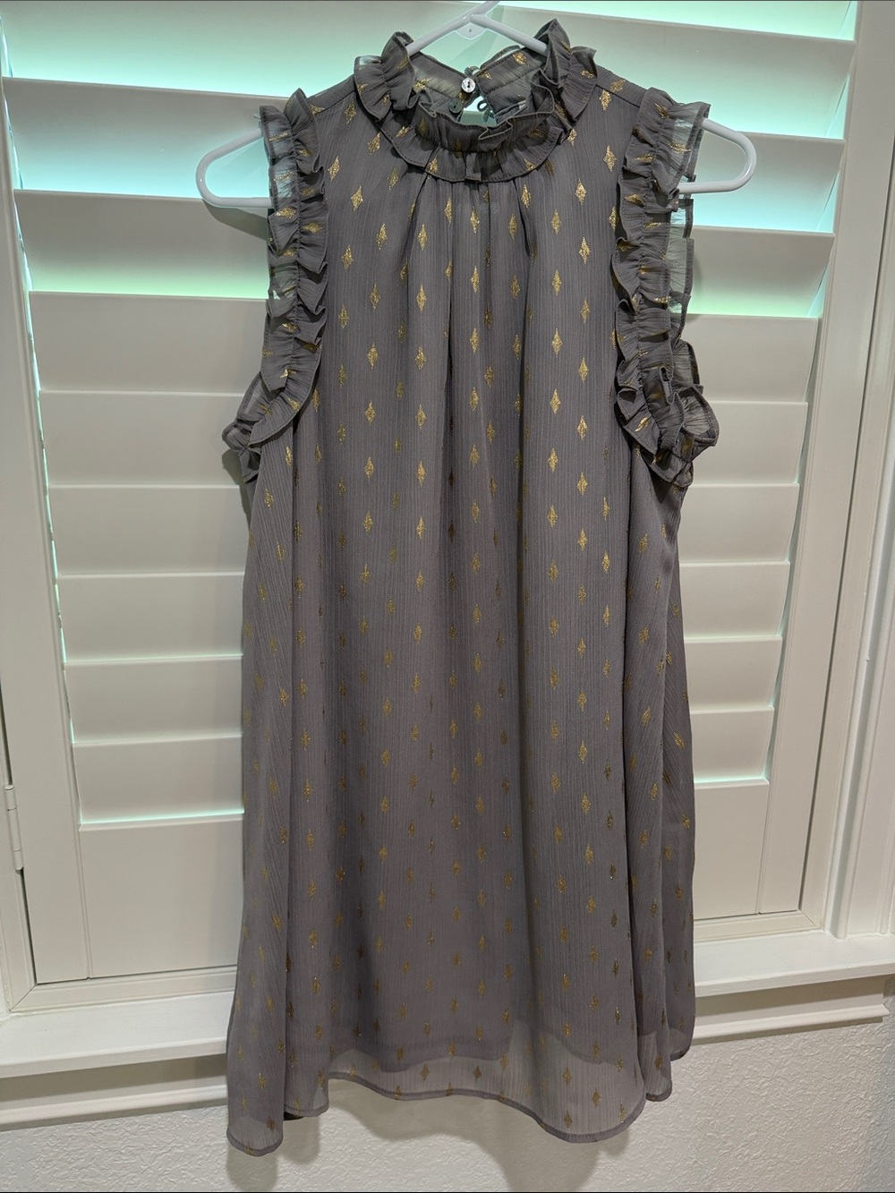 glam Gray Sleeveless Ruffle Mini Dress with Gold Foil Accents